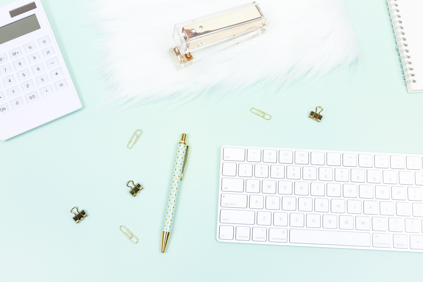 Keyboard and Office Supplies on Mint Background